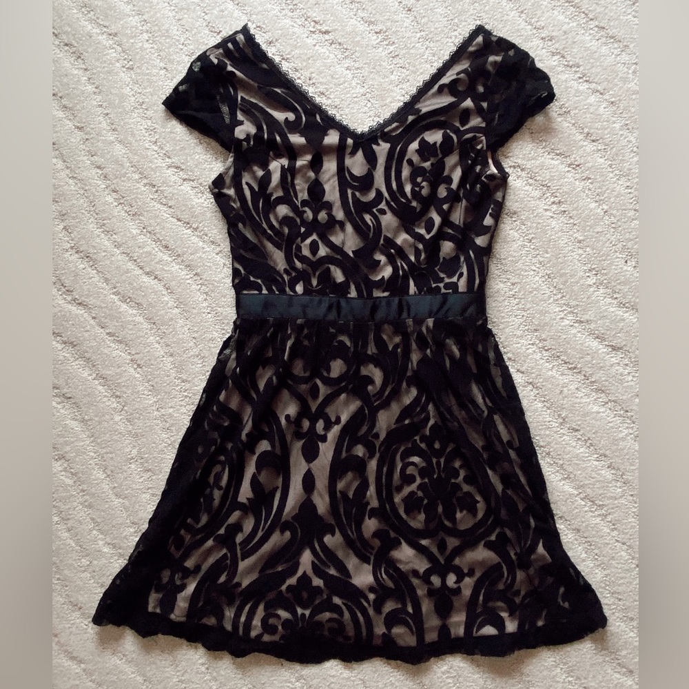 Beautiful black dress. Great for musicals and other formal events.